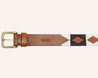 Light brown leather belt with black and white stitching. Zilker Belt logo embossing.